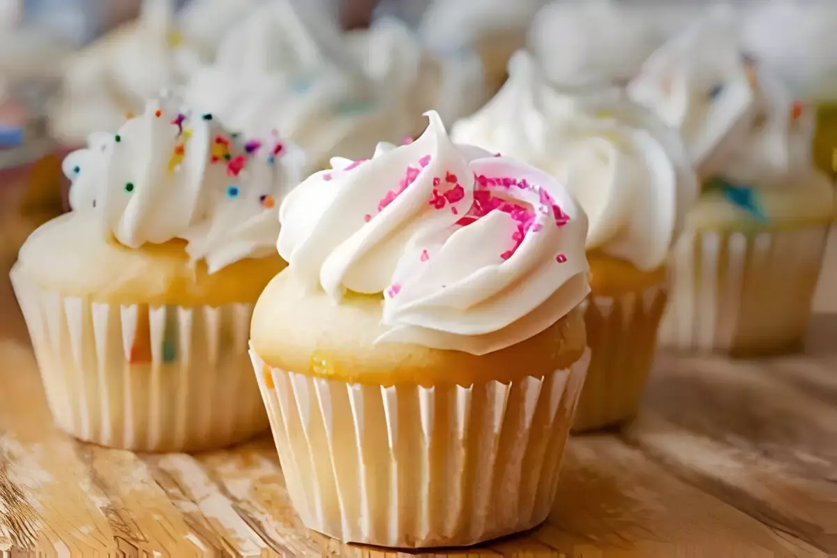 Decorated mini cupcakes with frosting and sprinkles