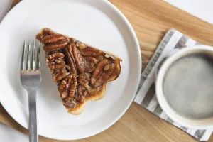 Sliced Pecan Pie with Whipped Cream