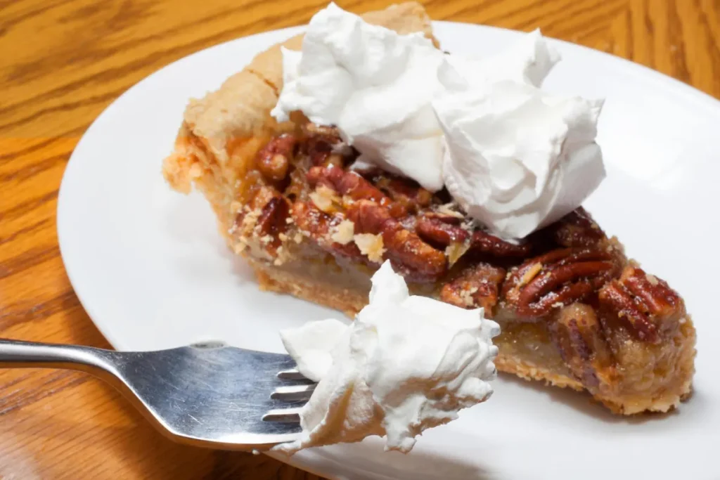 Pecan cream pie on a plate