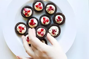 Chocolate small cupcake with creamy ganache topping