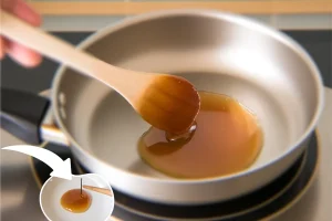 A step-by-step process of preventing caramel from sticking to a saucepan, highlighting key techniques.