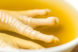 Close-up of tender chicken feet in a nourishing broth