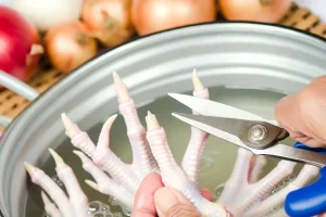 The process of preparing Chicken Feet for a nutritious soup.